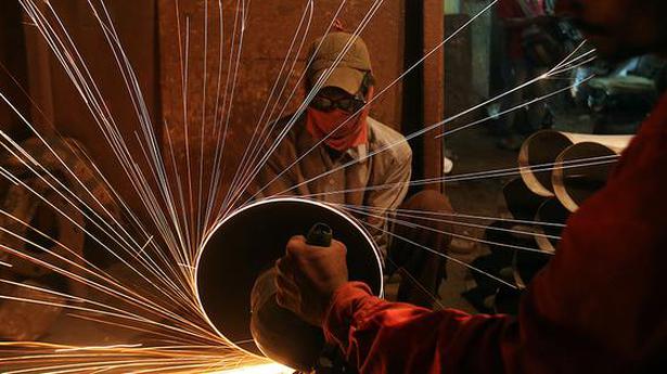 India's manufacturing sector activity eases to 9-month low in June