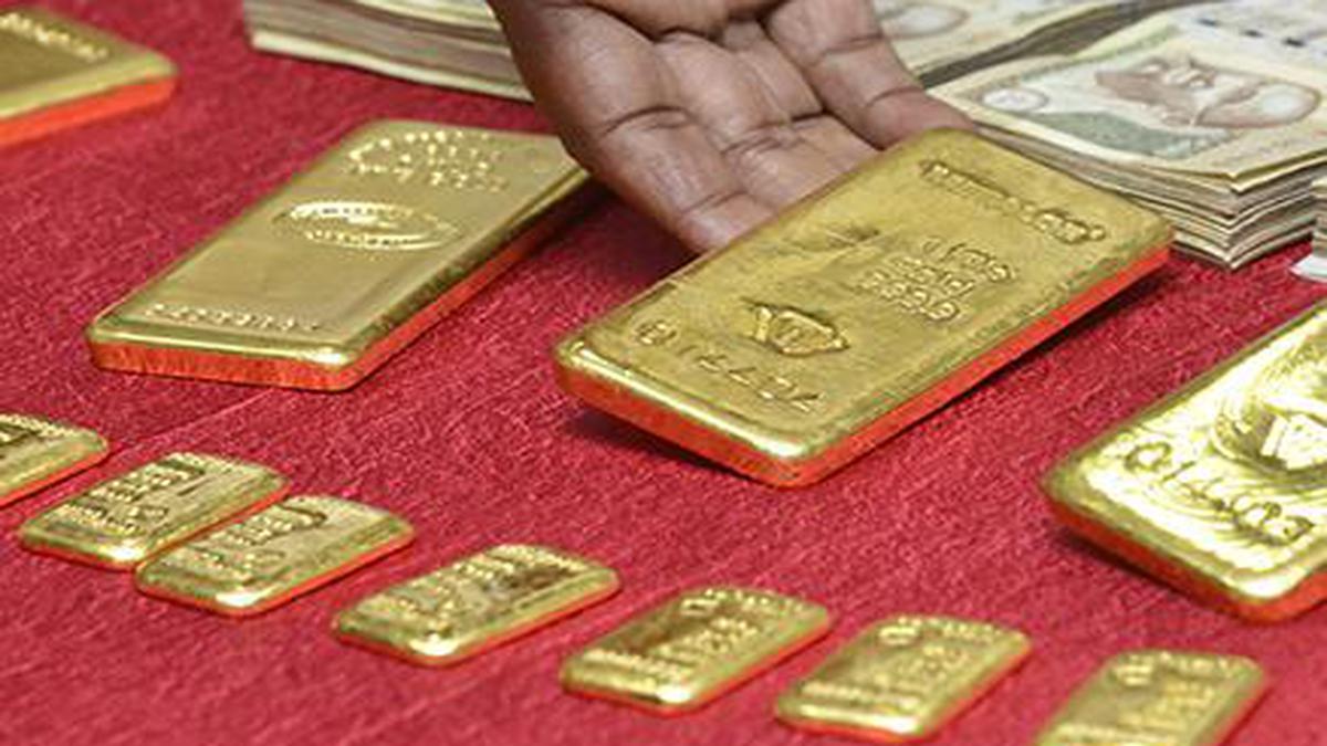 Customs superintendent at Calicut airport land in police net while handing over gold to two passengers