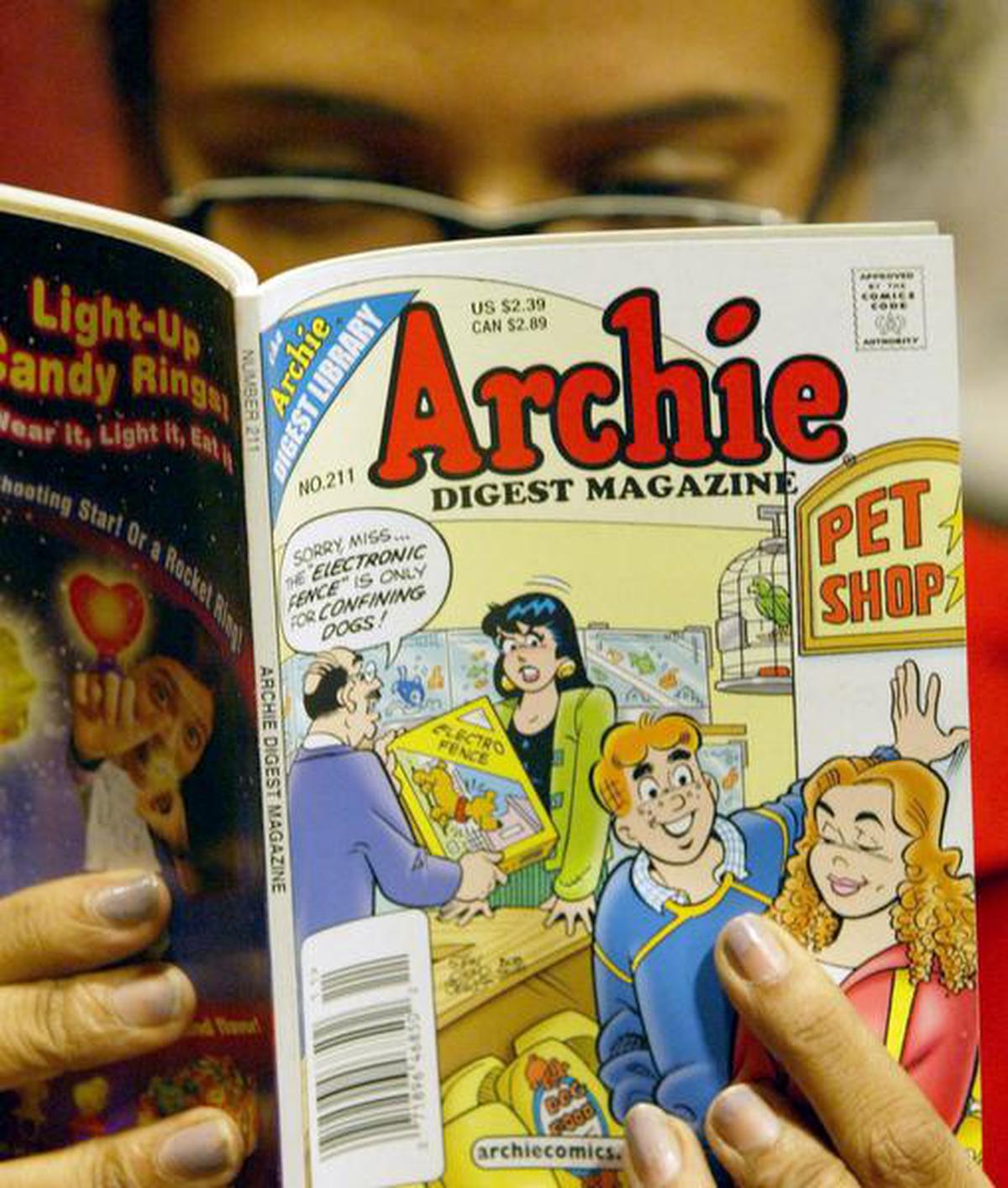 An enthusiast reads an ‘Archie’ comic at Oxford Book Shop in Calcutta