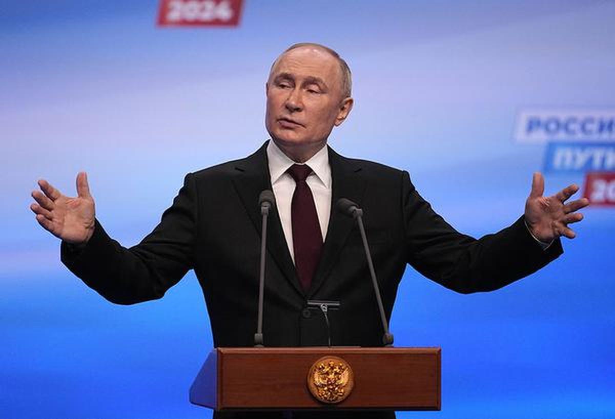 Russian President Vladimir Putin speaks on a visit to his campaign headquarters in Moscow.