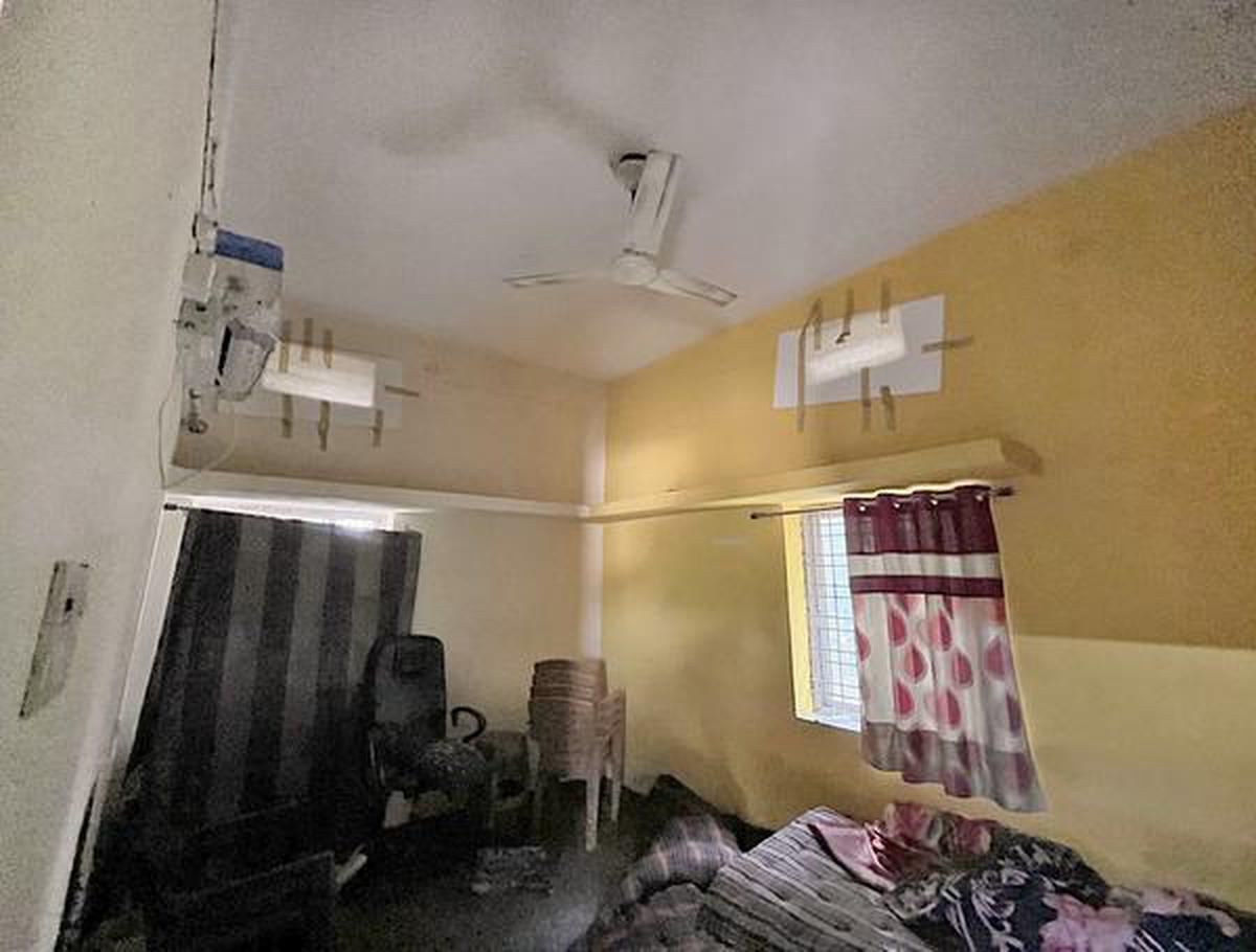 The bedroom where the accused lived with thermocol sheets and curtains covering the vents.
