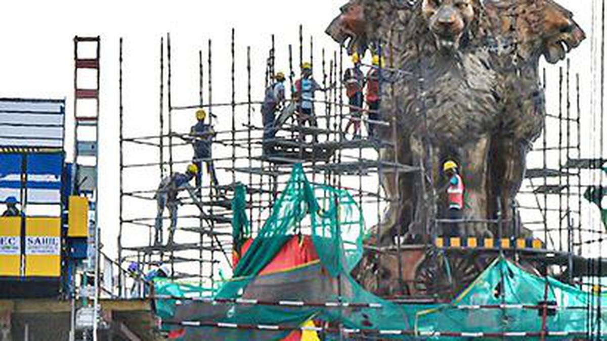 PM Modi unveils national emblem on new Parliament building