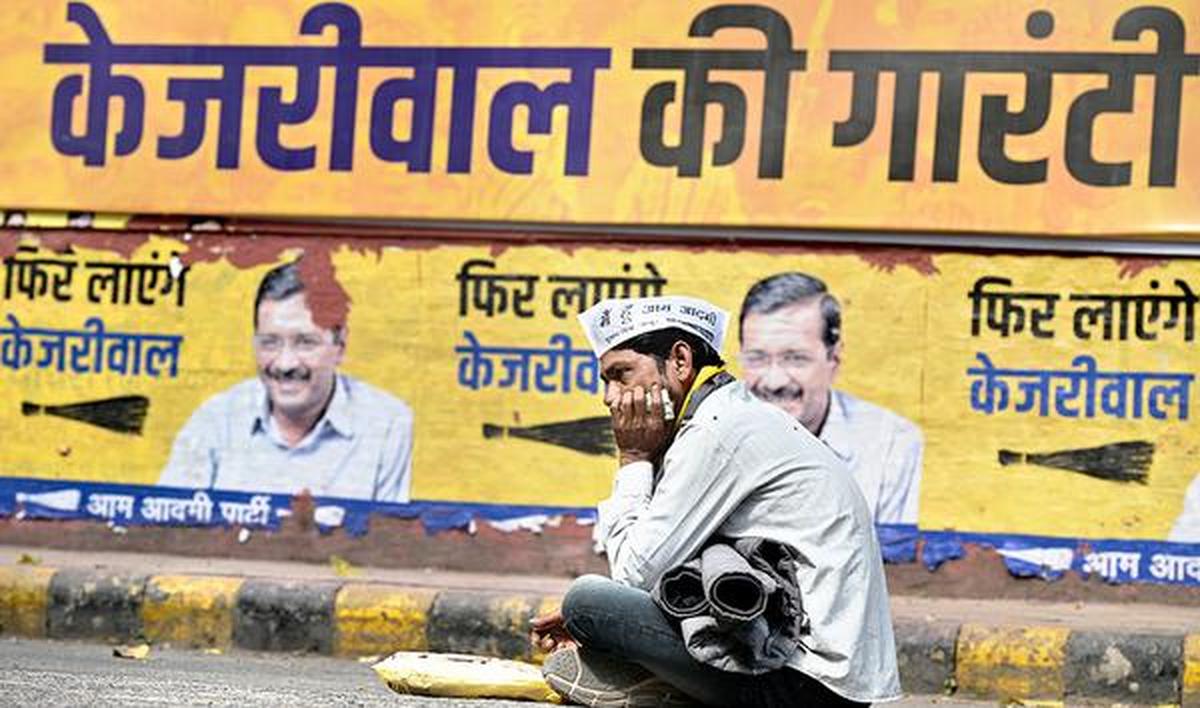 An AAP supporter outside the party headquarters in the national capital in February 2025. 
