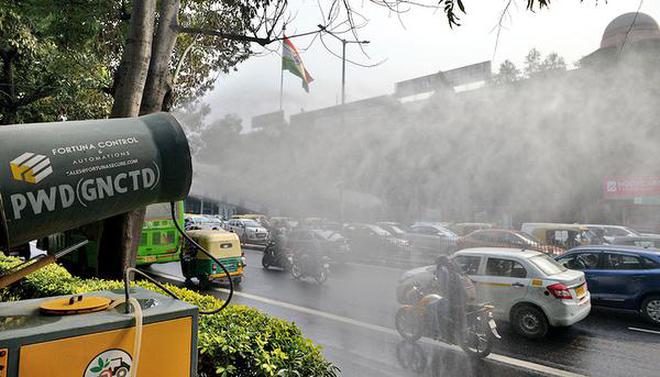 An anti-smog gun at work to curb pollution at ITO in Delhi. File photo