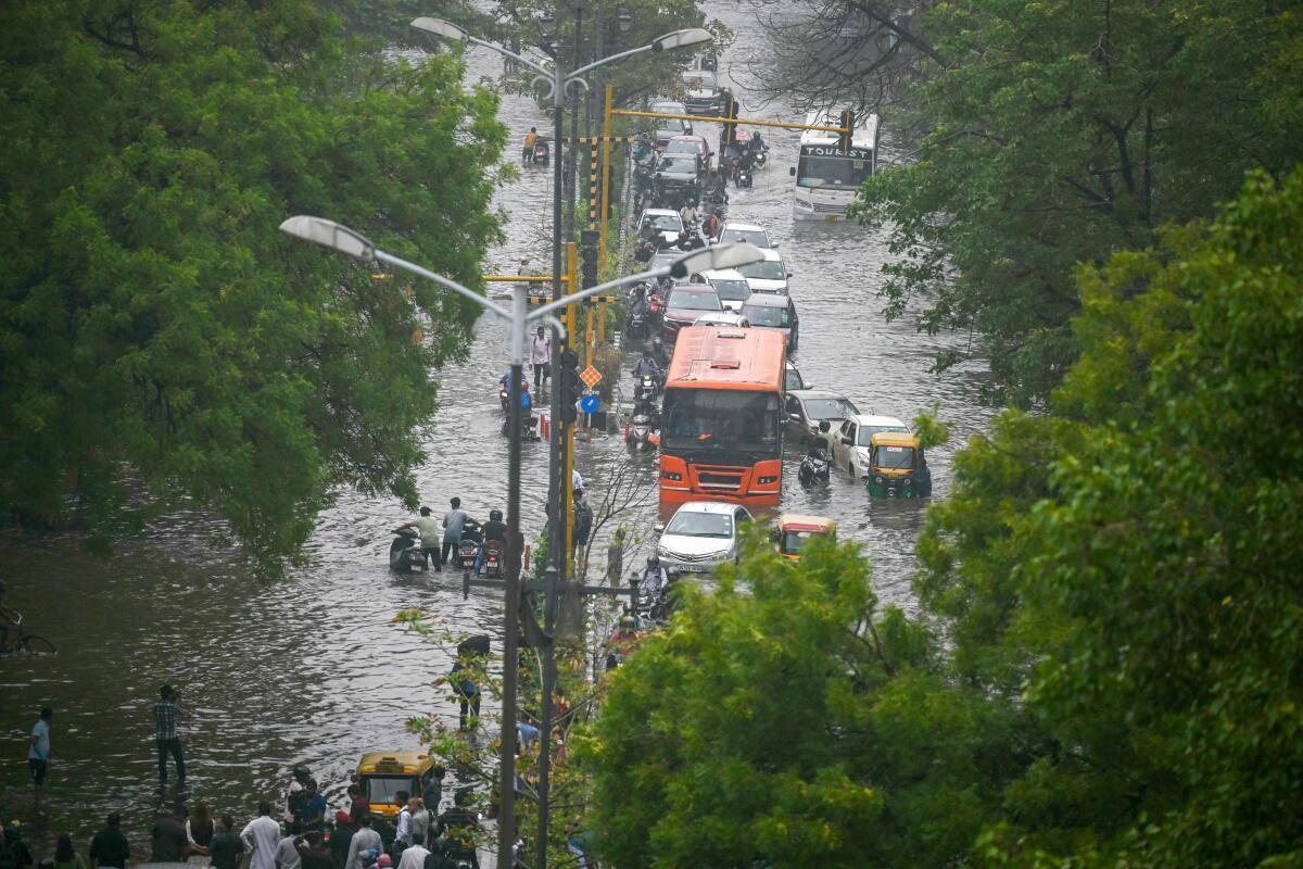 Delhi rain: People struggle with waterlogging and traffic jams